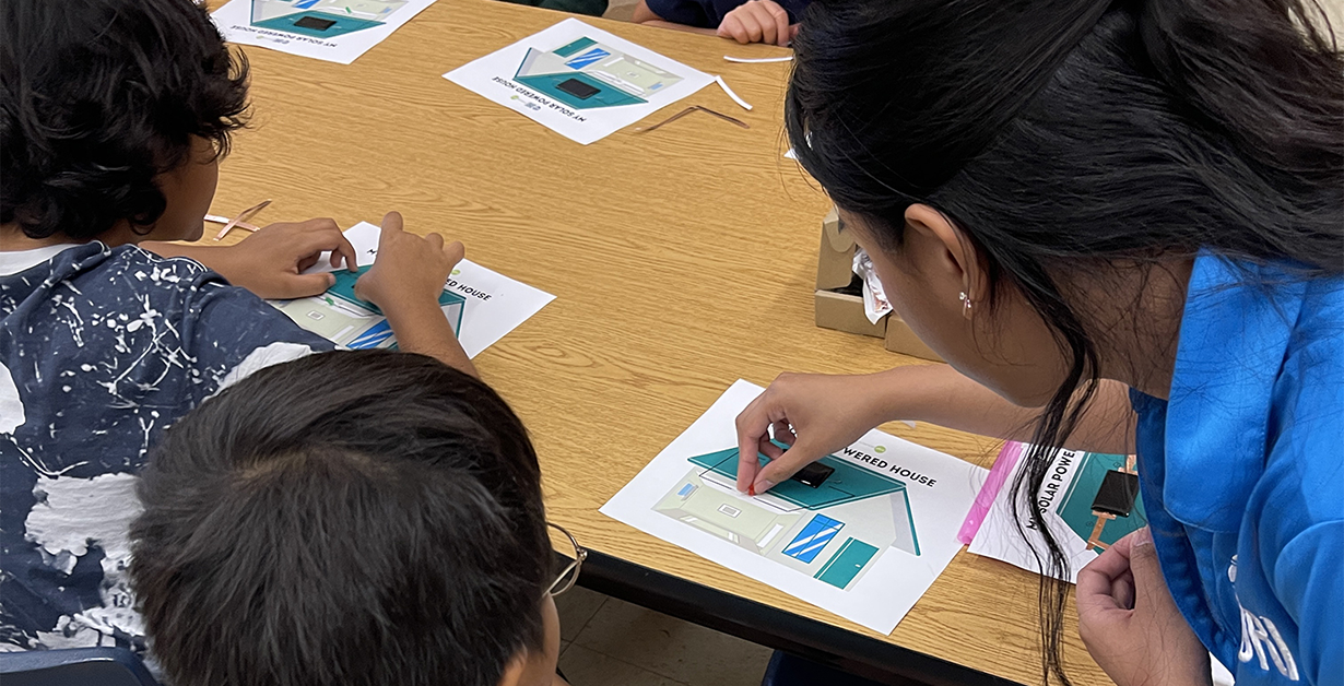 Instructor showing a student an evergysmart activity.