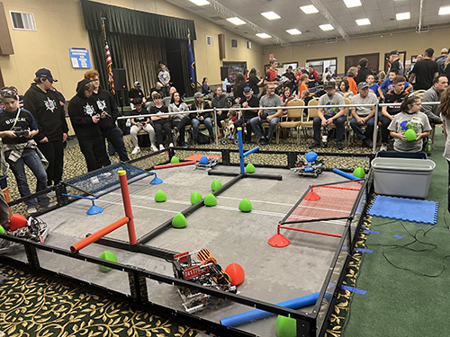 FR Robot Arena Small arena for robots with operators on one side and an audience on the other.