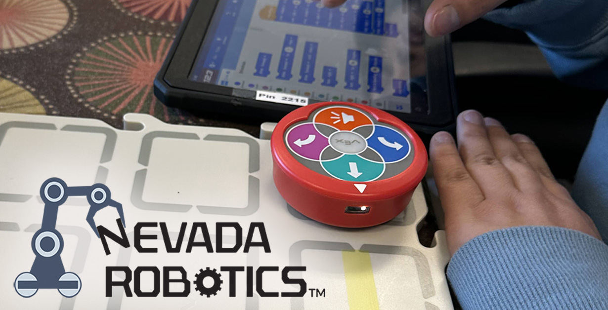 A round robot on a grid with a tablet next to it with the Nevada Robotics Logo.