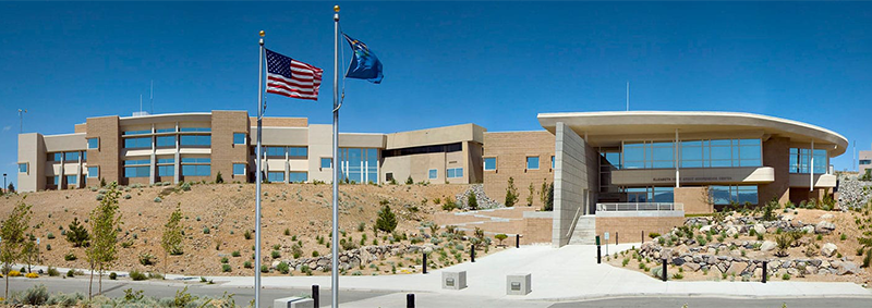 NWLDW Location DRI Reno Campus with flags flying out front.