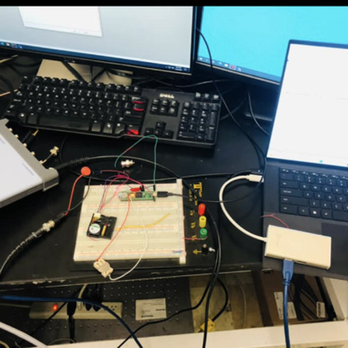 Opportunity A computer and laptop are connected to equipment on a desk.