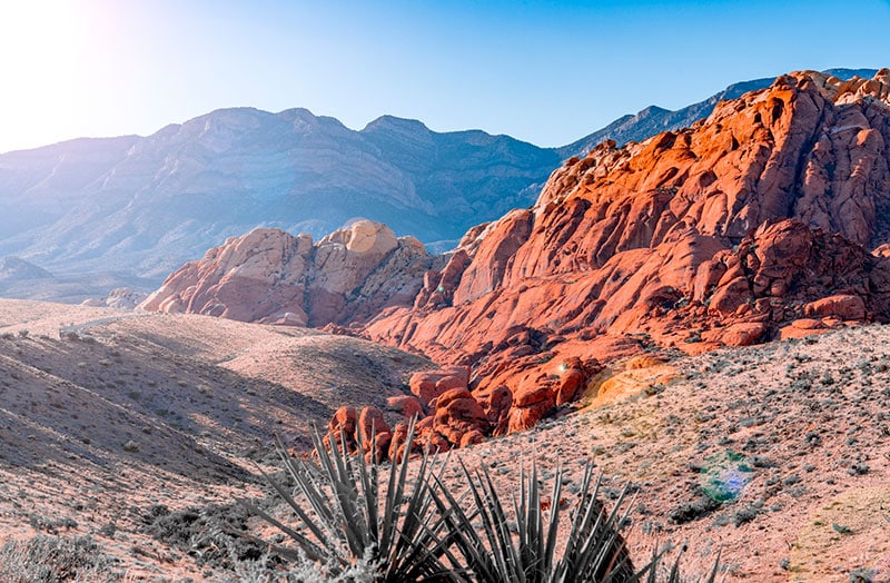 sun shines on Red Rock Canyon