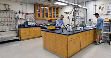 researchers in the soil laboratory