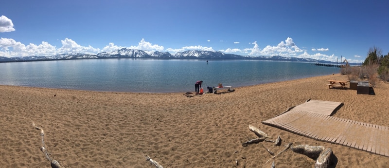 a beach at a lake